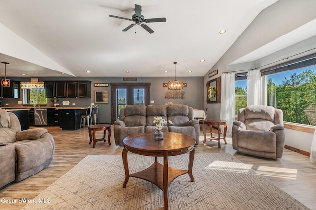 603 Schneiders Rd, Sagle, ID 83860 - living area featuring vaulted ceiling, recessed lighting, light wood-type flooring, ceiling fan, and a chandelier