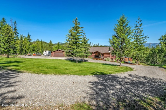 603 Schneiders Rd, Sagle, ID 83860 - view of home's community with a lawn and a garage