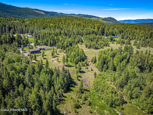 603 Schneiders Rd, Sagle, ID 83860 - aerial view of a forest and a mountain backdrop