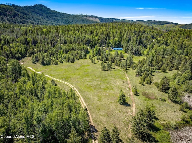 603 Schneiders Rd, Sagle, ID 83860 - bird's eye view of a heavily wooded area and a mountain backdrop