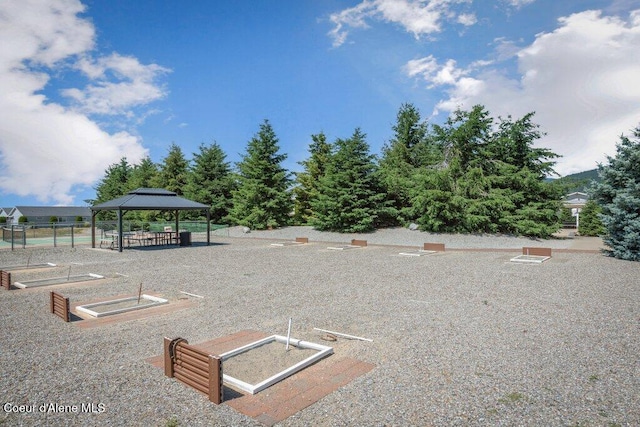 13458 N Bighorn Canyon St, Rathdrum, ID 83858 - surrounding community with a gazebo and a vegetable garden
