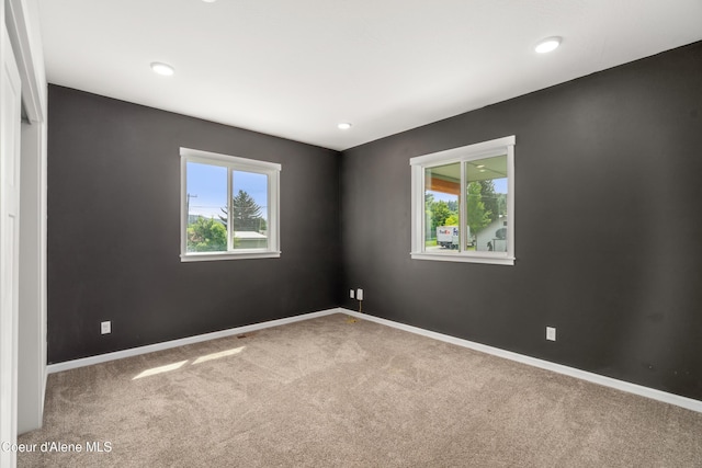 329 N 20th, Saint Maries, ID 83861 - carpeted empty room with healthy amount of natural light, baseboards, and recessed lighting
