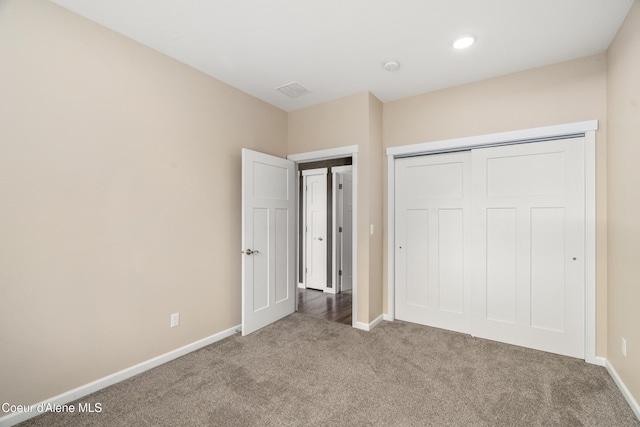 329 N 20th, Saint Maries, ID 83861 - unfurnished bedroom featuring carpet, baseboards, and a closet