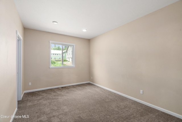 329 N 20th, Saint Maries, ID 83861 - carpeted spare room featuring baseboards and recessed lighting