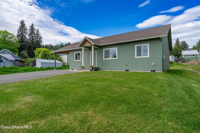 329 N 20th, Saint Maries, ID 83861 - view of front of home with a front lawn and asphalt driveway