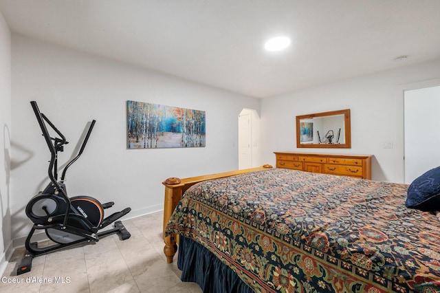bedroom featuring baseboards