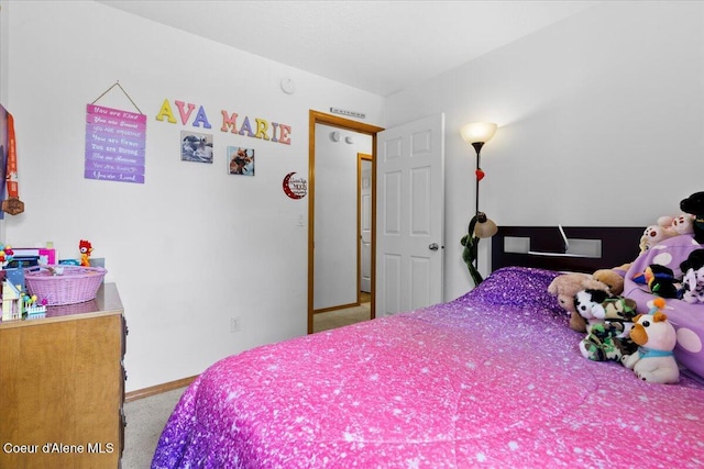 3459 E White Sands Ln, Post Falls, ID 83854 - bedroom with carpet flooring and baseboards