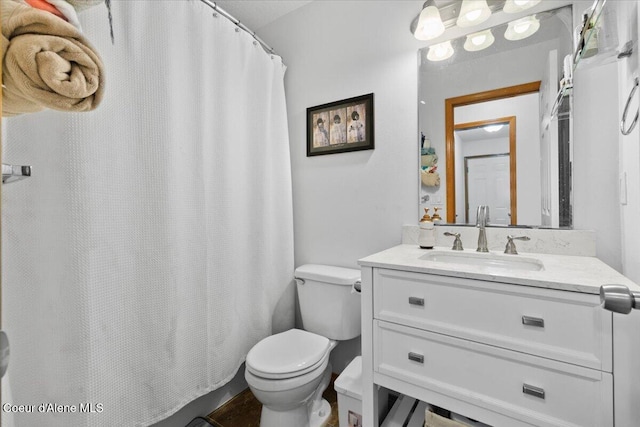 3459 E White Sands Ln, Post Falls, ID 83854 - full bath featuring toilet, vanity, and curtained shower