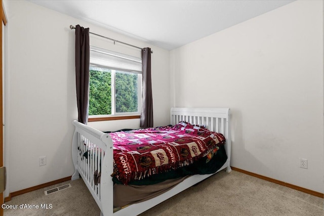 3459 E White Sands Ln, Post Falls, ID 83854 - carpeted bedroom featuring baseboards