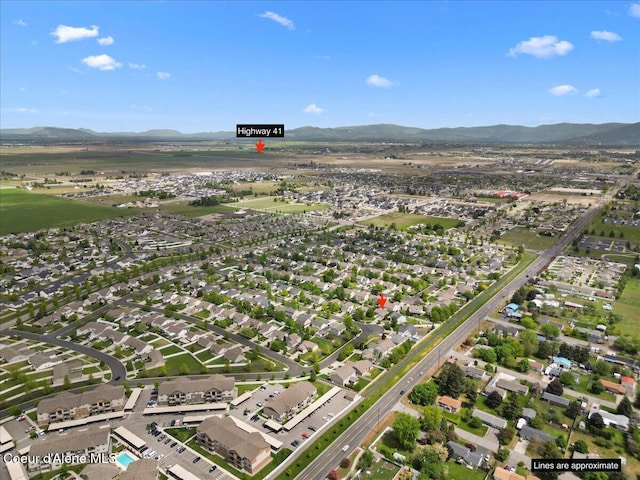 3459 E White Sands Ln, Post Falls, ID 83854 - view of property location with a mountain backdrop and nearby suburban area