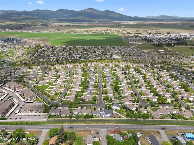 3459 E White Sands Ln, Post Falls, ID 83854 - aerial view of property and surrounding area with mountains and nearby suburban area