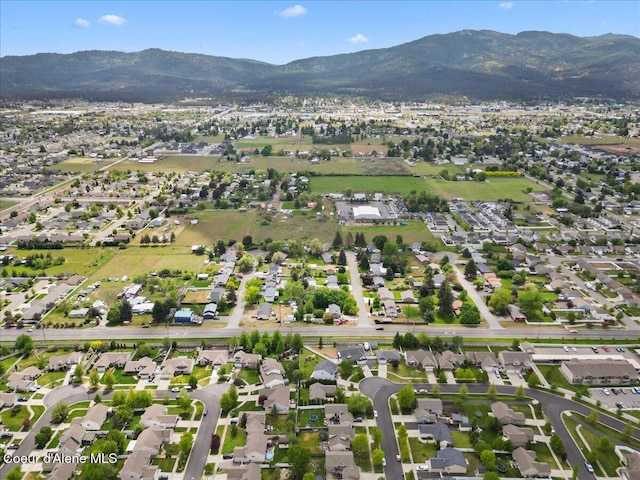 3459 E White Sands Ln, Post Falls, ID 83854 - aerial view of property's location with a mountainous background and nearby suburban area