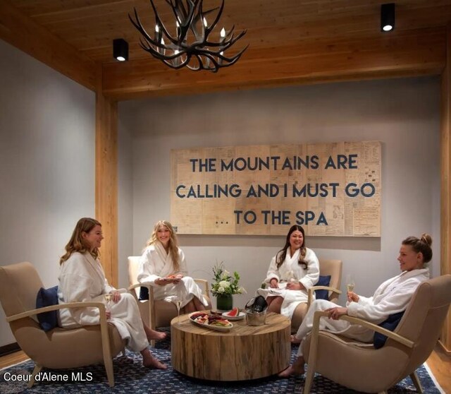 495 NW Psge # 103, Sandpoint, ID 83864 - interior space featuring a chandelier and wood ceiling
