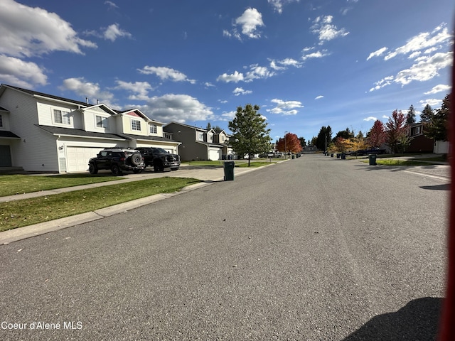 1374 N Kaleigh Ct, Coeur Dalene, ID 83814 - view of asphalt street featuring a residential view, sidewalks, and curbs