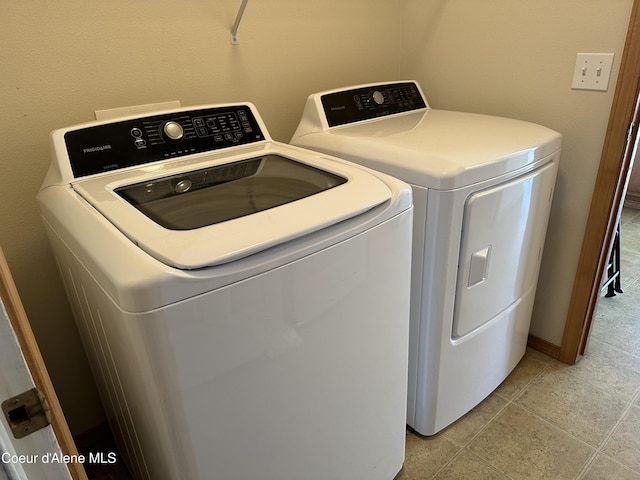 1374 N Kaleigh Ct, Coeur Dalene, ID 83814 - laundry area with washer and clothes dryer