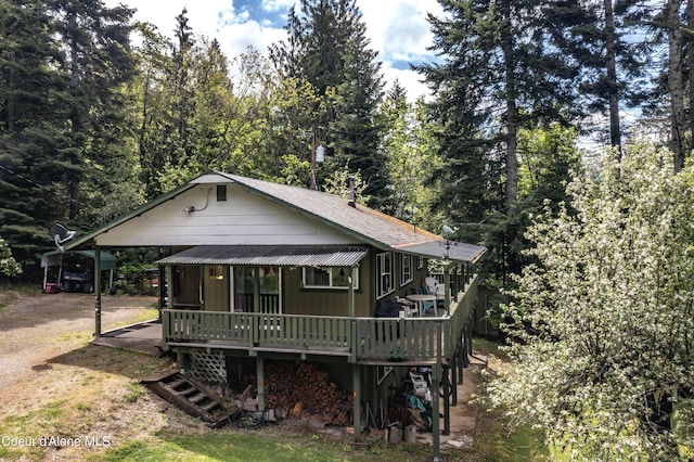 view of front of house featuring a wooden deck