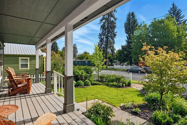 619 N Florence Ave, Sandpoint, ID 83864 - wooden deck with a porch