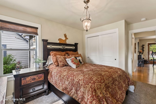 619 N Florence Ave, Sandpoint, ID 83864 - carpeted bedroom featuring a closet and baseboards