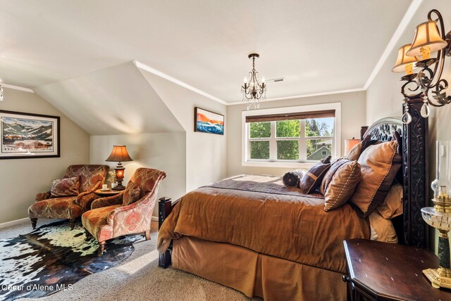 619 N Florence Ave, Sandpoint, ID 83864 - bedroom with carpet flooring, a chandelier, baseboards, and vaulted ceiling