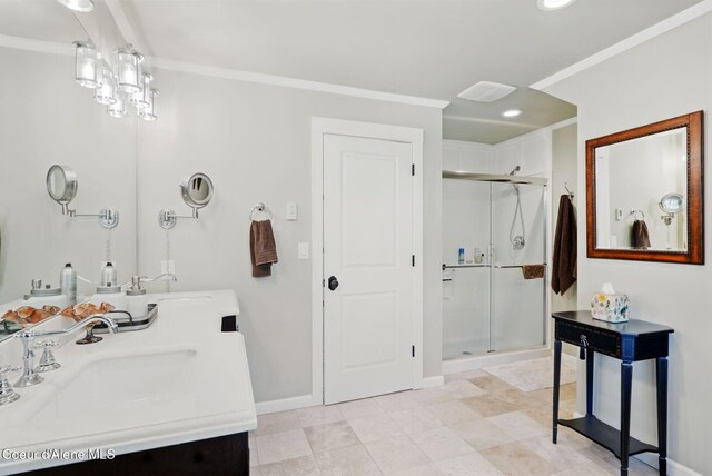 619 N Florence Ave, Sandpoint, ID 83864 - full bathroom featuring a stall shower, ornamental molding, baseboards, double vanity, and recessed lighting