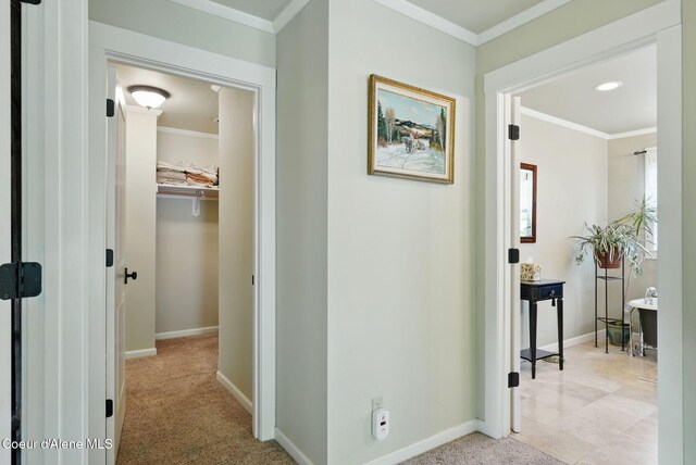 619 N Florence Ave, Sandpoint, ID 83864 - hallway featuring baseboards, ornamental molding, and light colored carpet