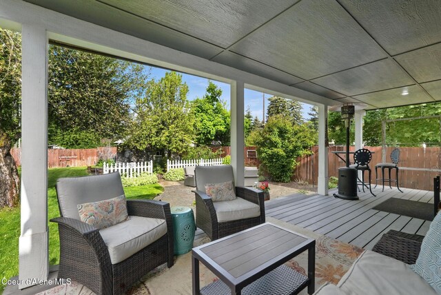 619 N Florence Ave, Sandpoint, ID 83864 - view of patio with a fenced backyard, an outdoor hangout area, and a wooden deck