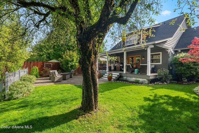 619 N Florence Ave, Sandpoint, ID 83864 - view of yard with a patio area, outdoor lounge area, and french doors