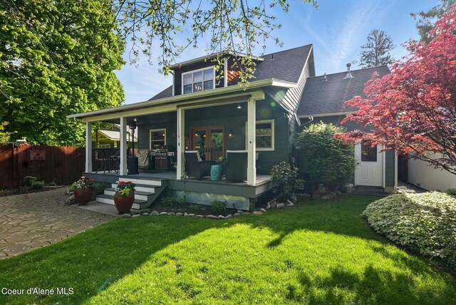 619 N Florence Ave, Sandpoint, ID 83864 - view of front of home featuring covered porch and a shingled roof