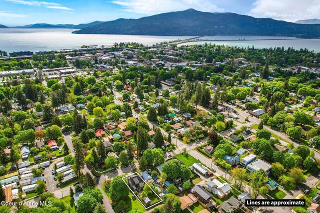 619 N Florence Ave, Sandpoint, ID 83864 - aerial overview of property's location with a water and mountain view and property parcel outlined