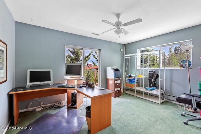 home office with ceiling fan and carpet flooring
