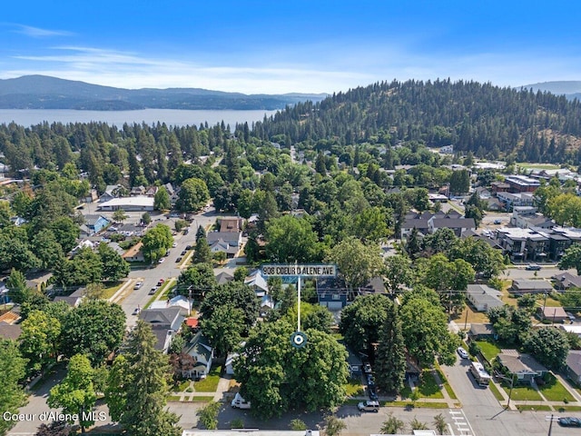 908 E Coeur D Alene Ave, Coeur Dalene, ID 83814 - aerial view of a heavily wooded area and a water and mountain view