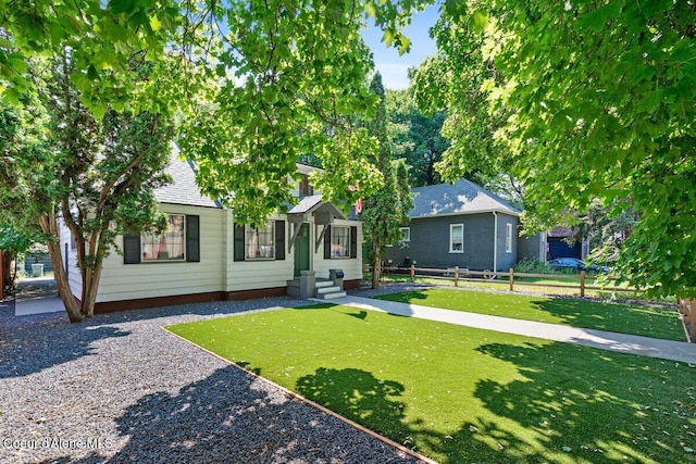 908 E Coeur D Alene Ave, Coeur Dalene, ID 83814 - view of front facade with roof with shingles and entry steps