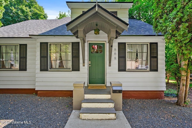908 E Coeur D Alene Ave, Coeur Dalene, ID 83814 - view of front of property with roof with shingles