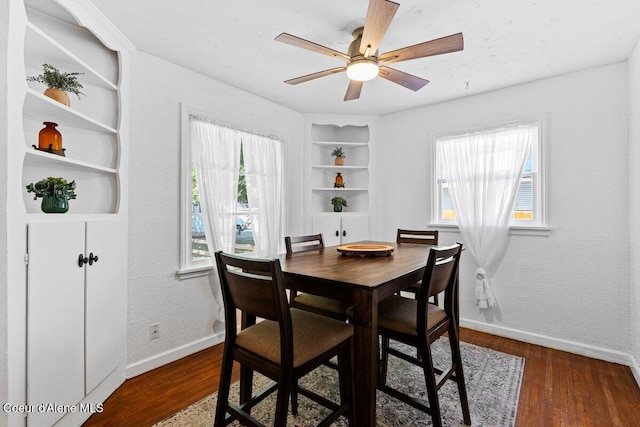 908 E Coeur D Alene Ave, Coeur Dalene, ID 83814 - dining space with wood finished floors, healthy amount of natural light, and built in features