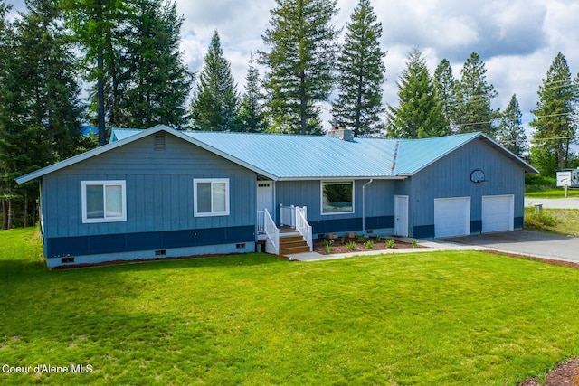 42 Bodie Ln, Priest River, ID 83856 - ranch-style home with crawl space, an attached garage, driveway, metal roof, and a front lawn