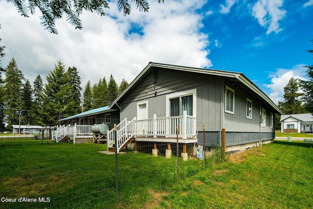 42 Bodie Ln, Priest River, ID 83856 - view of property exterior with a yard and heating fuel