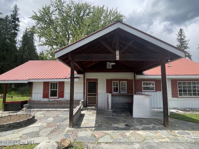 84 Highland Flats Rd, Naples, ID 83847 - view of front of property with metal roof