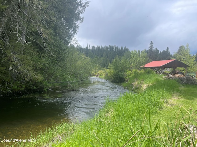 84 Highland Flats Rd, Naples, ID 83847 - water view with a heavily wooded area