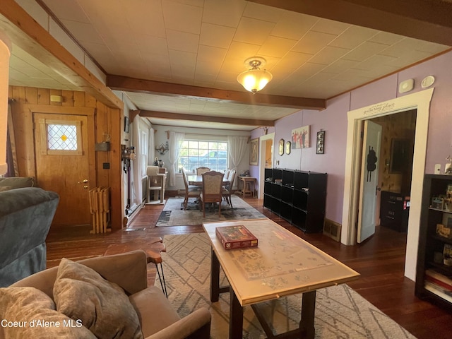 84 Highland Flats Rd, Naples, ID 83847 - living room with dark wood-type flooring and beamed ceiling