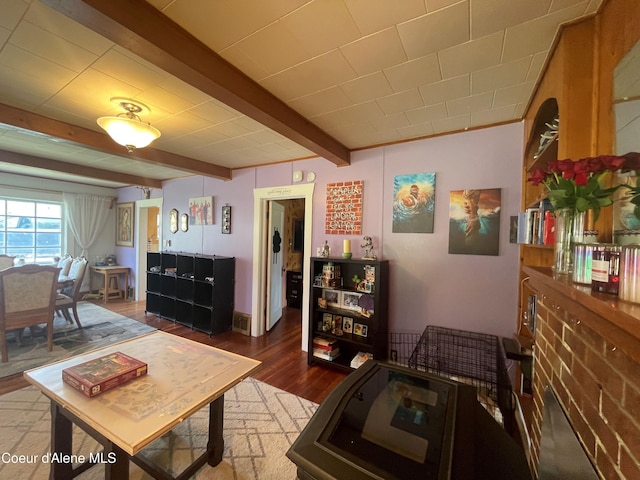 84 Highland Flats Rd, Naples, ID 83847 - living area with wood finished floors and beam ceiling