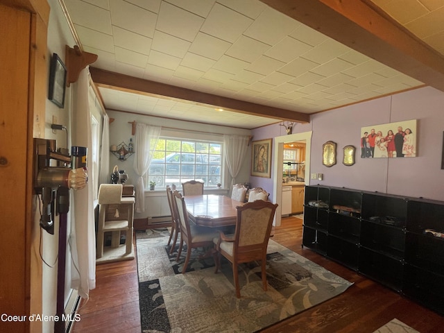 84 Highland Flats Rd, Naples, ID 83847 - dining area featuring wood-type flooring, beamed ceiling, and a baseboard heating unit