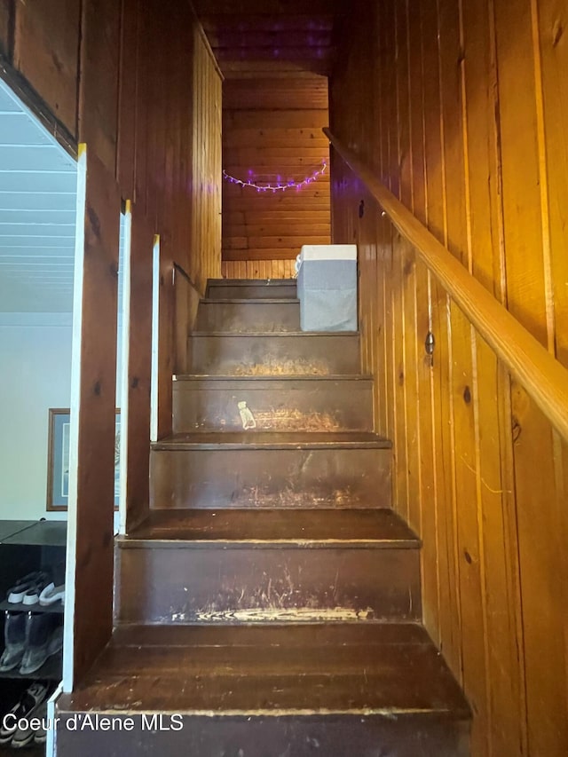 84 Highland Flats Rd, Naples, ID 83847 - staircase featuring wood walls