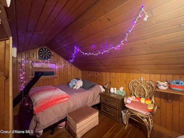 84 Highland Flats Rd, Naples, ID 83847 - bedroom featuring wooden walls, vaulted ceiling, wood ceiling, and wood finished floors