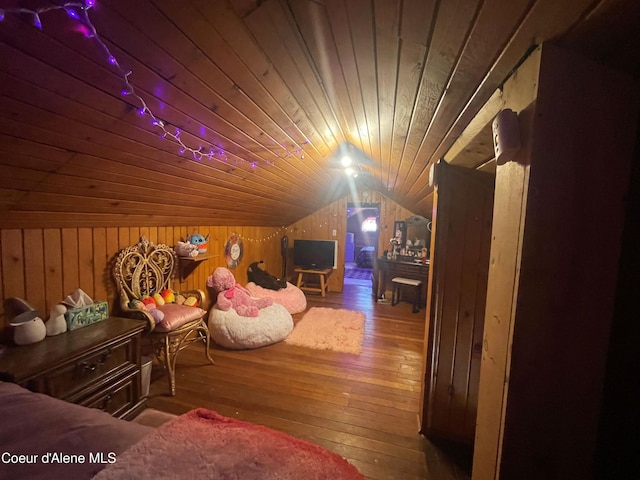 84 Highland Flats Rd, Naples, ID 83847 - bedroom featuring wooden walls, wood-type flooring, lofted ceiling, and wooden ceiling
