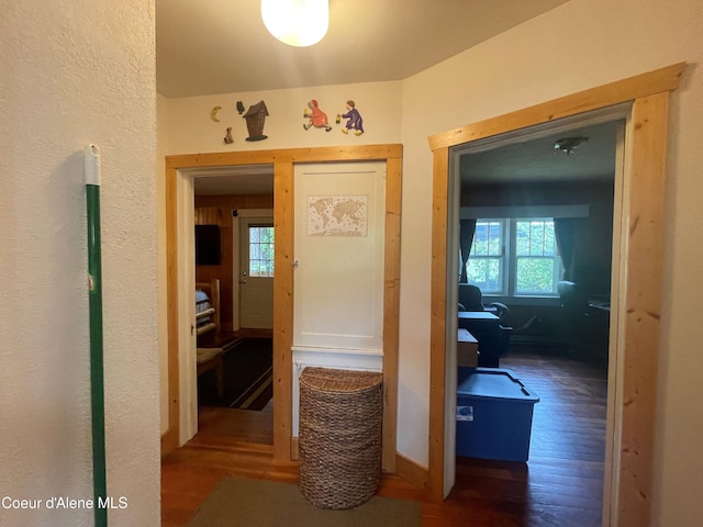 84 Highland Flats Rd, Naples, ID 83847 - corridor with wood finished floors, an office area, and baseboards