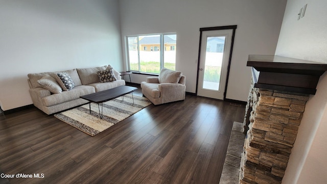 2941 N Wrenley Ln, Post Falls, ID 83854 - living area with dark wood-type flooring and baseboards