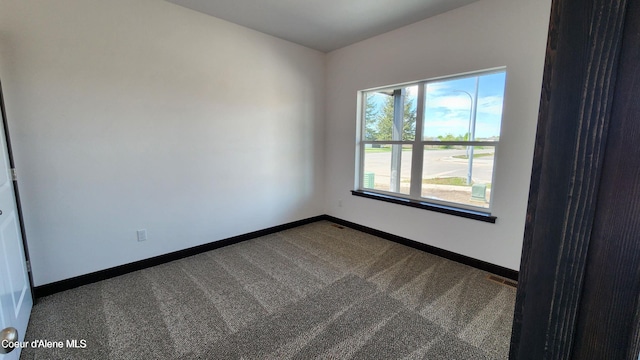 2941 N Wrenley Ln, Post Falls, ID 83854 - carpeted spare room featuring baseboards