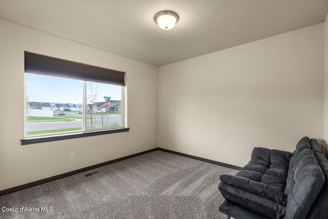 12613 N Lattner St, Rathdrum, ID 83858 - unfurnished room featuring carpet floors and baseboards