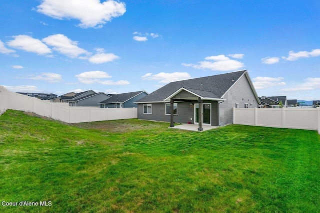 12613 N Lattner St, Rathdrum, ID 83858 - back of house featuring a patio