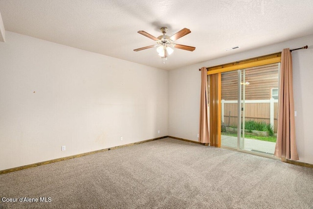 15360 N Nixon Loop, Rathdrum, ID 83858 - carpeted empty room featuring a ceiling fan, baseboards, and a textured ceiling